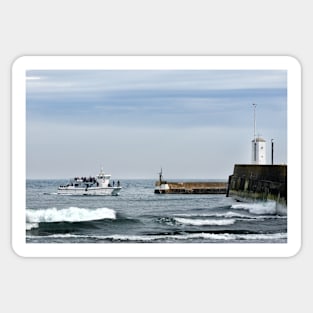 Tour boat returning from the Farne Islands to harbour, Northumberland, UK Sticker